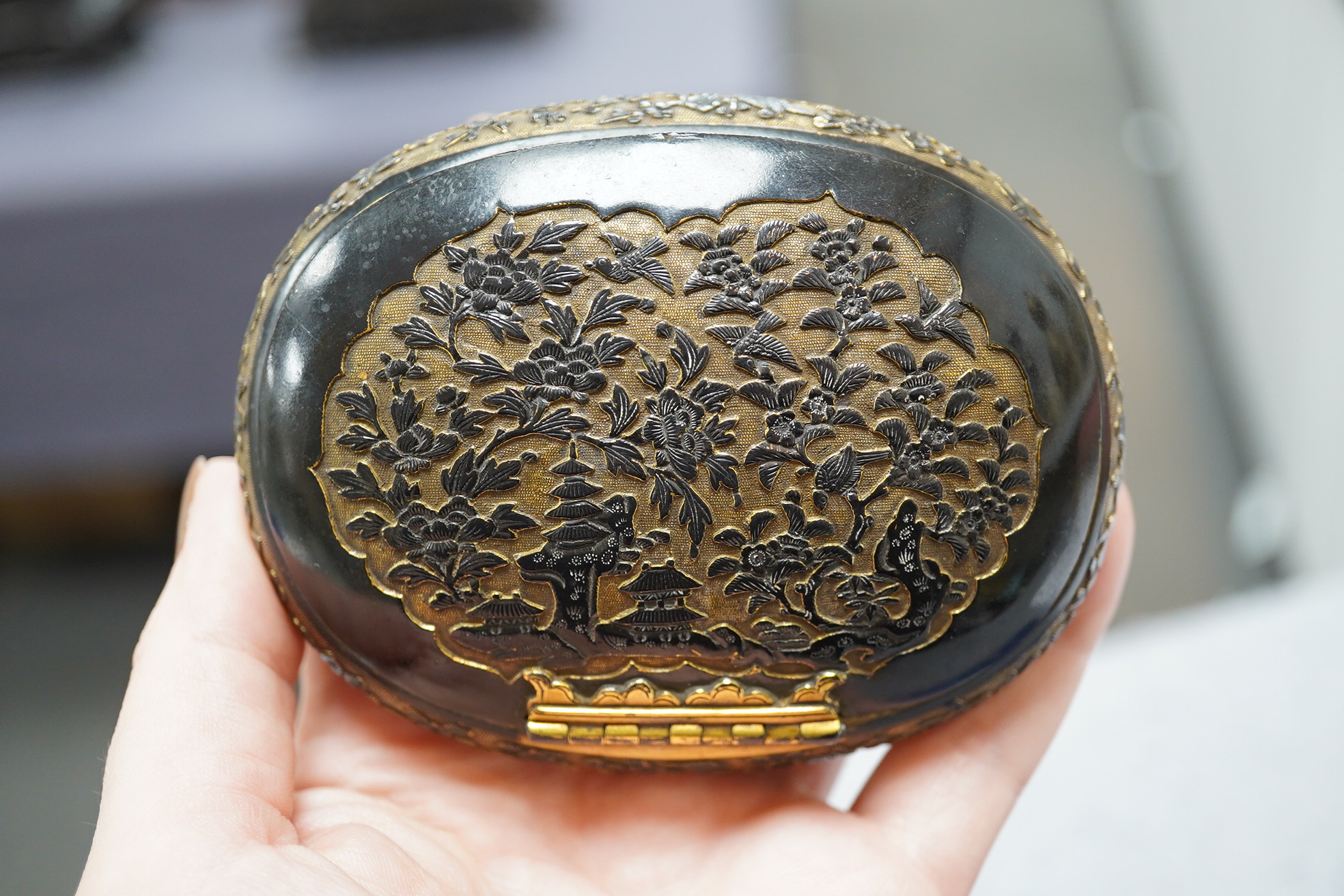 A Japanese export gilt bronze Sawasa oval tobacco box, 18th century